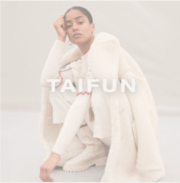 Junge dynamische Frau in Taifun Outfit